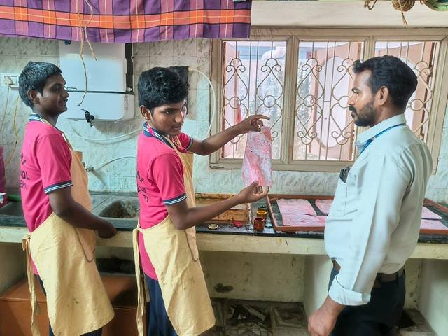 Students in a vocational session with a trainer